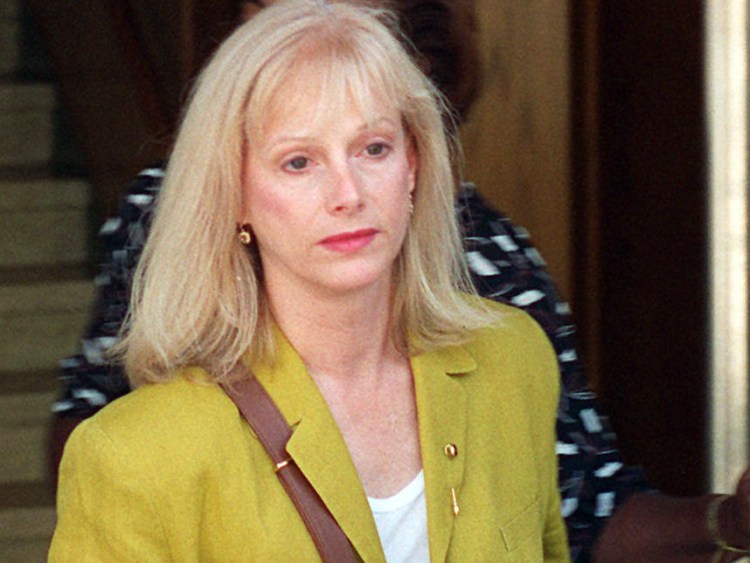 Sondra Locke leaves court in 1996 in Burbank, Calif., after opening statements in a civil suit against her former live-in boyfriend, Clint Eastwood.