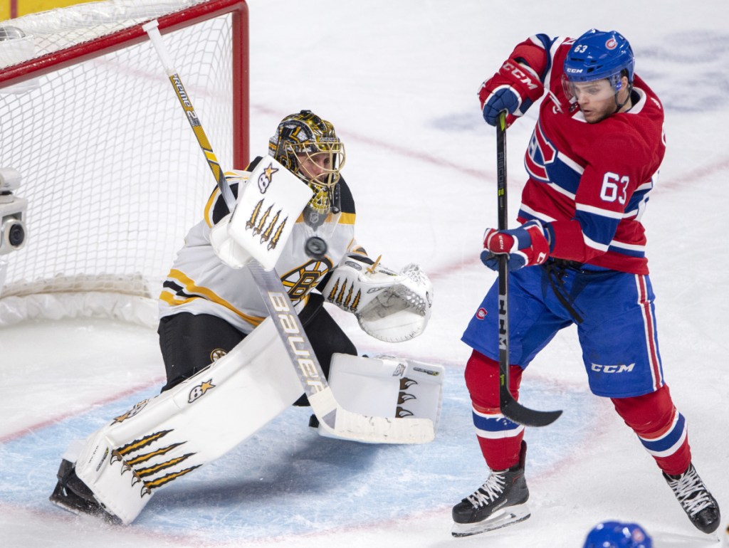 Bruins goaltender Jaroslav Halak stops Montreal center Matthew Peca during Boston's 4-0 win Monday in Montreal.