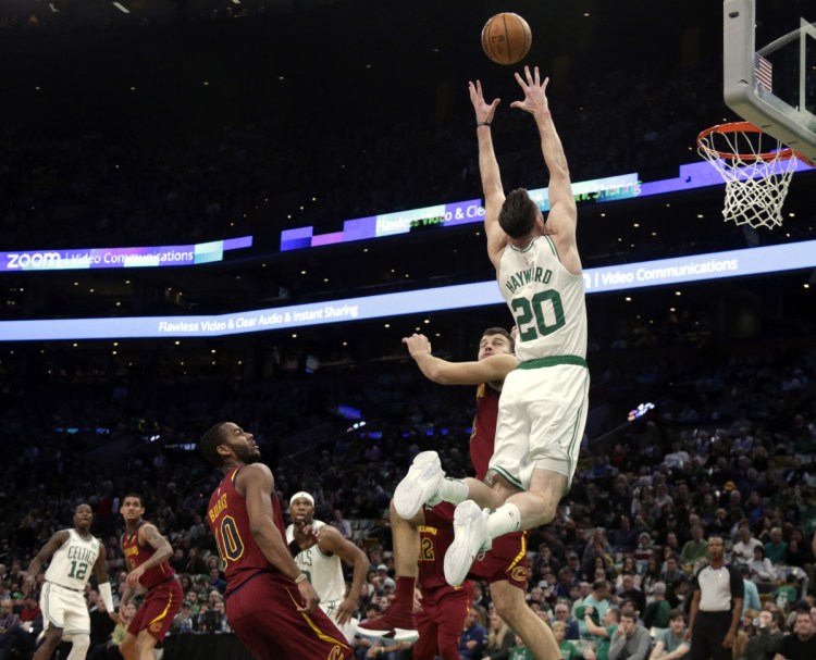 Celtics forward Gordon Hayward goes up for an unsuccessful alley-oop during a game against Cleveland on Nov. 30 in Boston. Hayward has shown flashes of his pre-injury form, but it's a long recovery process.