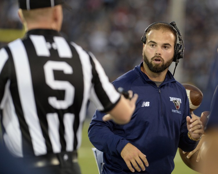 Joe Harasymiak reacts to an official during a UMaine football game against Connecticut in 2016. Brought aboard in 2011, he was hired to replace Coach Jack Cosgrove in November 2015.