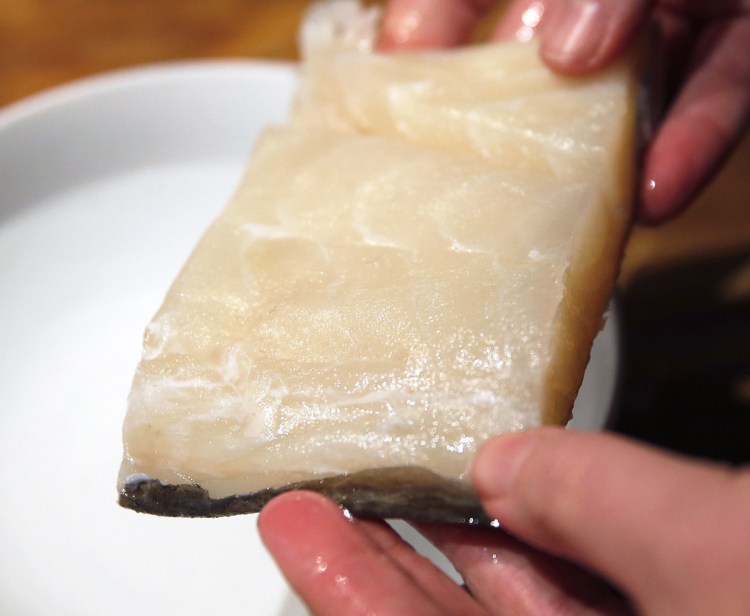 Salt cod is reconstituted in water before being simmered in milk.