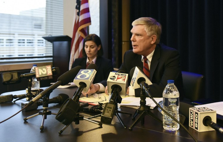 Special counsel Bill Forsyth, right, answers questions Friday during a news conference in Lansing, Mich., regarding the independent special counsel's investigation into Michigan State University's handling of the sexual abuse scandal involving disgraced former sports doctor Larry Nassar. Assistant Attorney General Christina Grossi is at left.