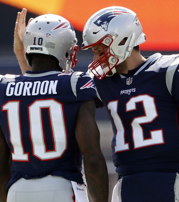 Josh Gordon, who was suspended Thursday for a substance abuse violation, was given a locker next to Tom Brady’s, and had numerous conversations with Patriots Coach Bill Belichick.