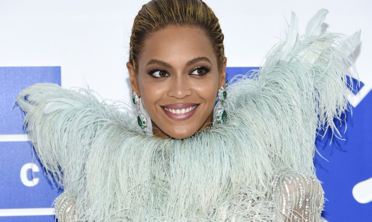 Beyonce Knowles released two albums Friday, but both featured previous hits and alternate tracks.