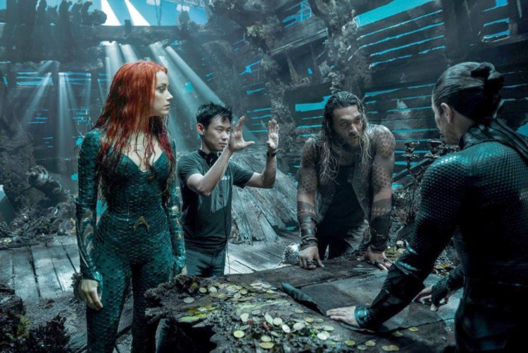 James Wan, second from left, directs a scene during the filming of "Aquaman." 