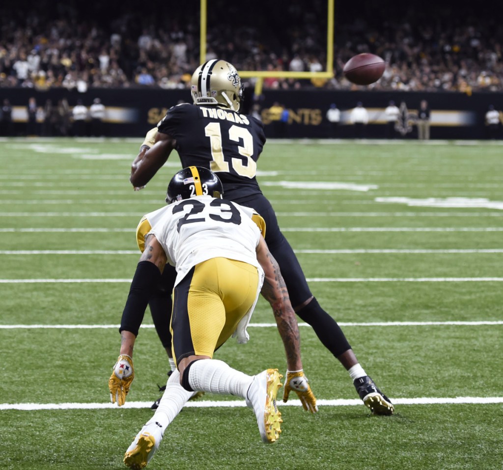 Saints wide receiver Michael Thomas pulls in the winning touchdown reception in front of Steelers cornerback Joe Haden, giving New Orleans a 31-28 victory Sunday,.