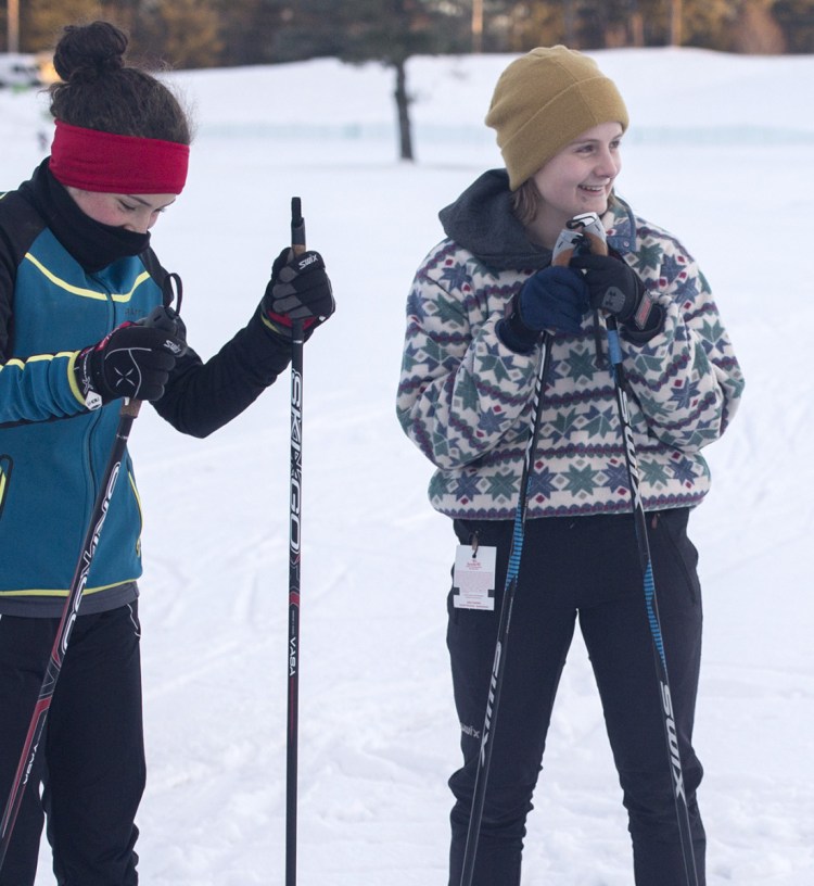 PORTLAND, ME - DECEMBER 18: Grace Tumavicus, of Deering High, center, talks with teammates during Portland Nordic Skiing practice on Tuesday, December 18, 2018. (Staff photo by Brianna Soukup/Staff Photographer)
