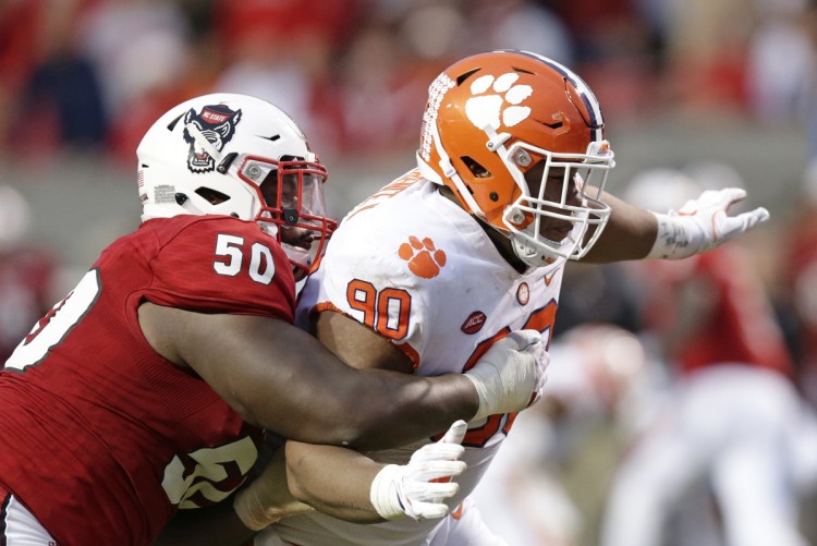 Clemson's Dexter Lawrence, right, will not play Saturday against Notre Dame after his suspension for a failed drug test was upheld on Thursday.