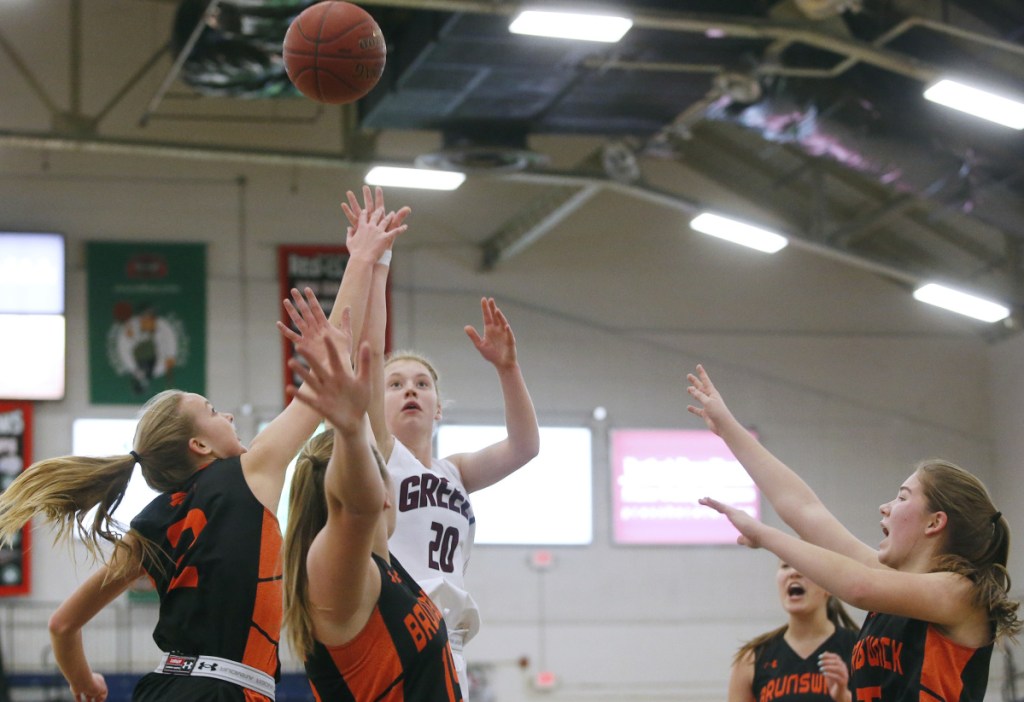There could be four players around her but it made no difference Friday to Anna DeWolfe, who scored 25 points to lead Greely to a 67-46 victory against Brunswick at the Portland Expo. Greely has a 20-game winning streak.