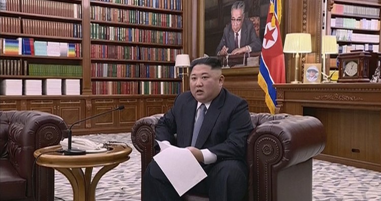 North Korean leader Kim Jong Un delivers a speech in this undated photo distributed Jan. 1.
