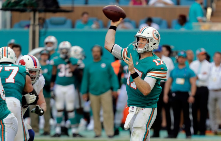 Quarterback Ryan Tannehill  and the Miami Dolphins don't put up huge numbers, but at 6-6 they are in the hunt for a playoff berth.