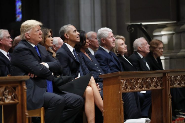 From left, President Trump, first lady Melania Trump, former President Barack Obama, former first lady Michelle Obama, former President Bill Clinton, former Secretary of State Hillary Clinton, and former President Jimmy Carter and former first lady Rosalynn Carter listen as former President George W. Bush speaks during Wednesday's state funeral at the National Cathedral in Washington. 