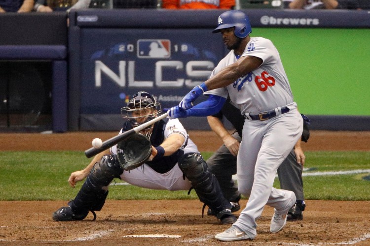 The Dodgers shook up their National League-championship roster trading Yasiel Puig, Matt Kemp and left-hander Alex Wood and cash to the Cincinnati Reds for right-hander Homer Bailey. (AP Photo/Charlie Riedel, File)