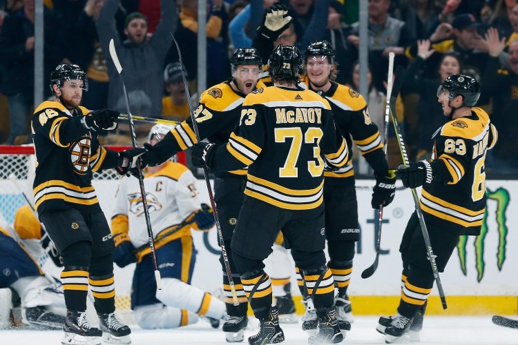 Patrice Bergeron, center, returned to the Bruins lineup after a lengthy absence due to injury. His return made an instant impact.