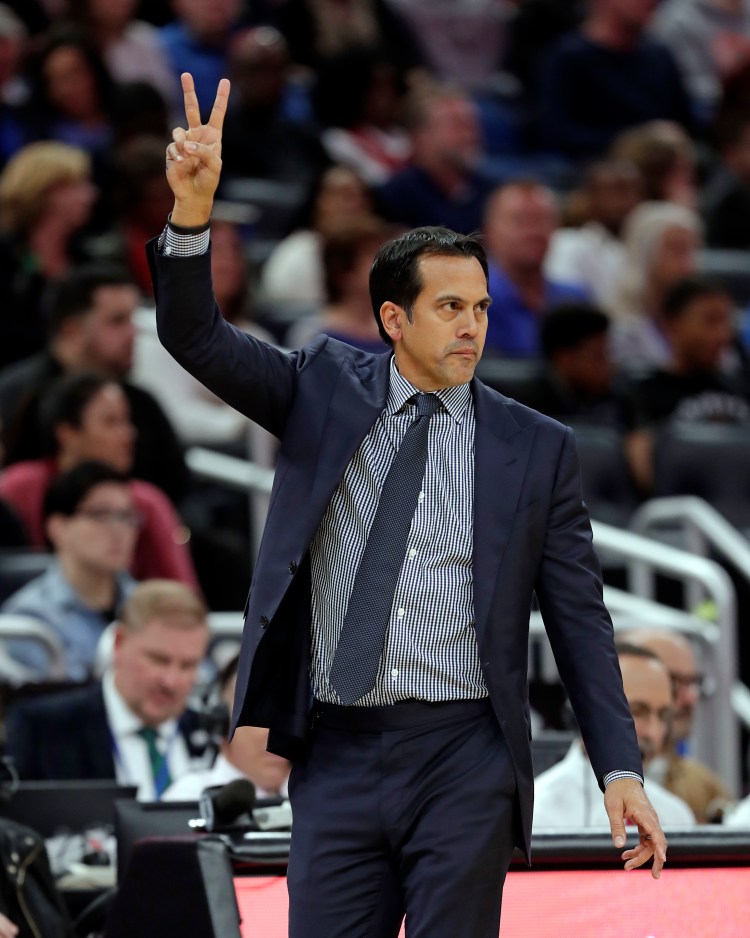 Miami Coach Erik Spoelstra directs his players during the Heat's 115-92 win over Orlando on Sunday in Orlando, Florida. It was the 500th career win of Spoelstra's coaching career. 