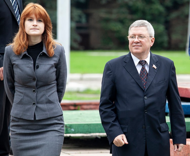 Maria Butina walks with Alexander Torshin then a member of the Russian upper house of parliament in Moscow, Russia in 2012.