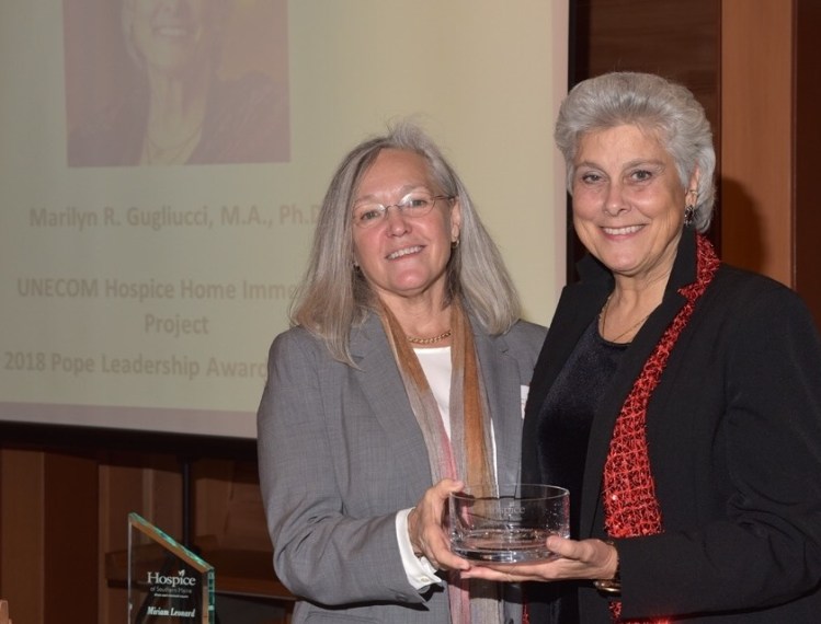 Dr. Katherine Pope, left, presented a leadership award recently from Hospice of Southern Maine to Marilyn Gugliucci, director of geriatrics education and research at the University of New England and its College of Osteopathic Medicine.