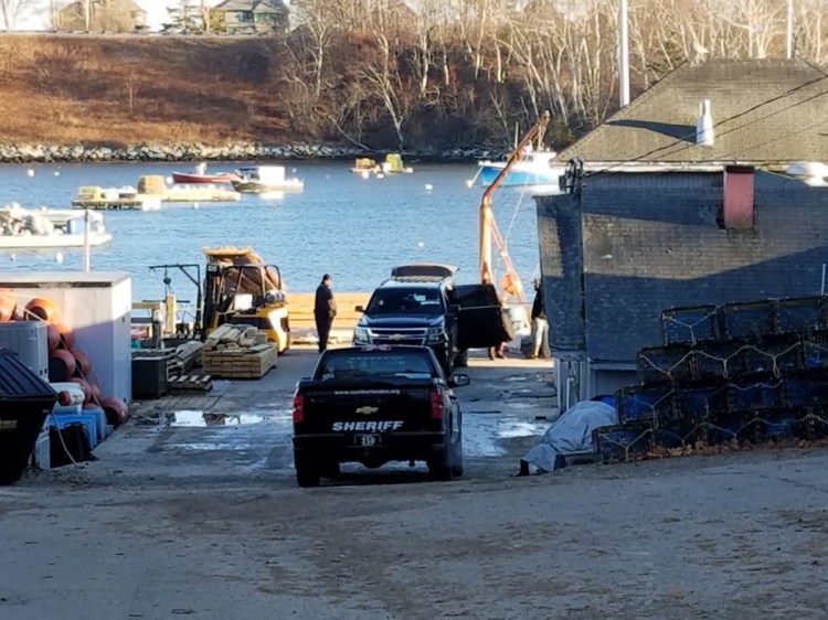 Police arrive at Bailey Island Lobster Company, after a projectile labeled “live round” was brought in on a fishing boat. 