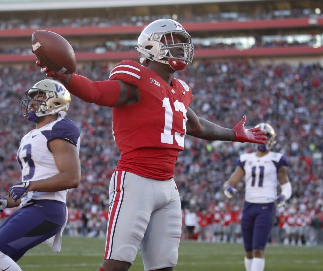 Ohio State tight end Rashod Berry looks to the crowd after scoring a touchdown against Washington during the first half of the Rose Bowl on Tuesday. Ohio State won, 28-23.
