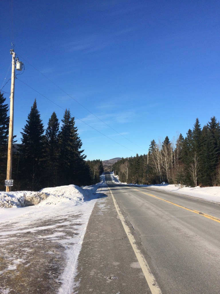 A Central Maine Power Co. line runs across U.S. Route 201 in Jackman. Residents filed a complaint against the utility with the state's Public Utilities Commission in December over what they say are increasingly longer and more frequent power outages across town.