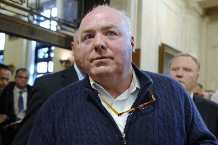 Michael Skakel leaves the Connecticut Supreme Court after his hearing in February 2016. The U.S. Supreme Court is leaving in place a decision that vacated a murder conviction against Skakel. The high court on Monday declined a request from the state of Connecticut to hear the case.