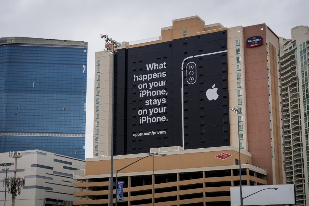 A billboard touts the data security of Apple iPhones in Las Vegas, site of the annual consumer technology conference. Tech giants Google and Samsung are there but Apple is not, yet that didn't stop it from taking a jab at Google, its Silicon Valley rival.