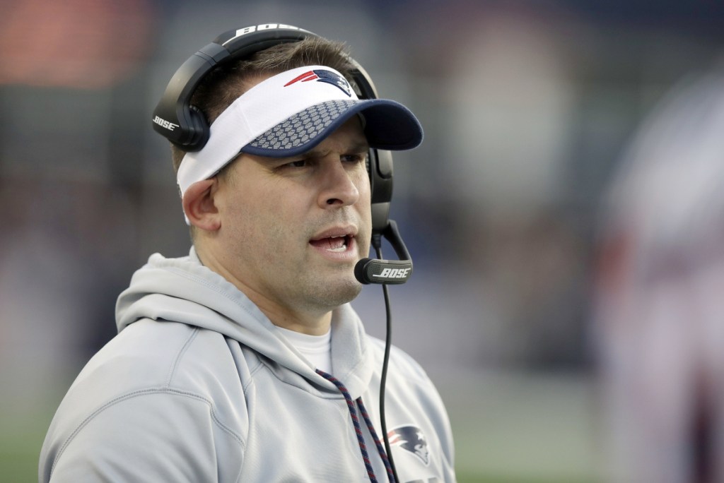 New England Patriots offensive coordinator Josh McDaniels said Tuesday he will forgo any NFL head coaching vacancies this winter. (AP Photo/Charles Krupa, File)