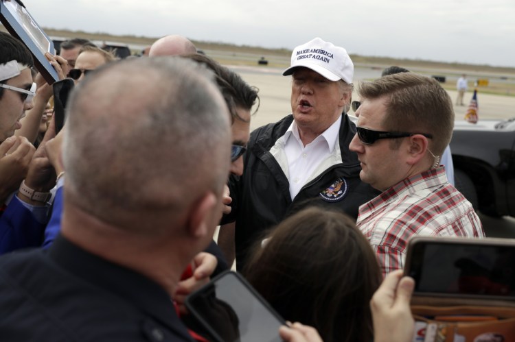 President Trump greets people after arriving at McAllen International Airport for a visit to the southern border on Thursday in McAllen, Texas.