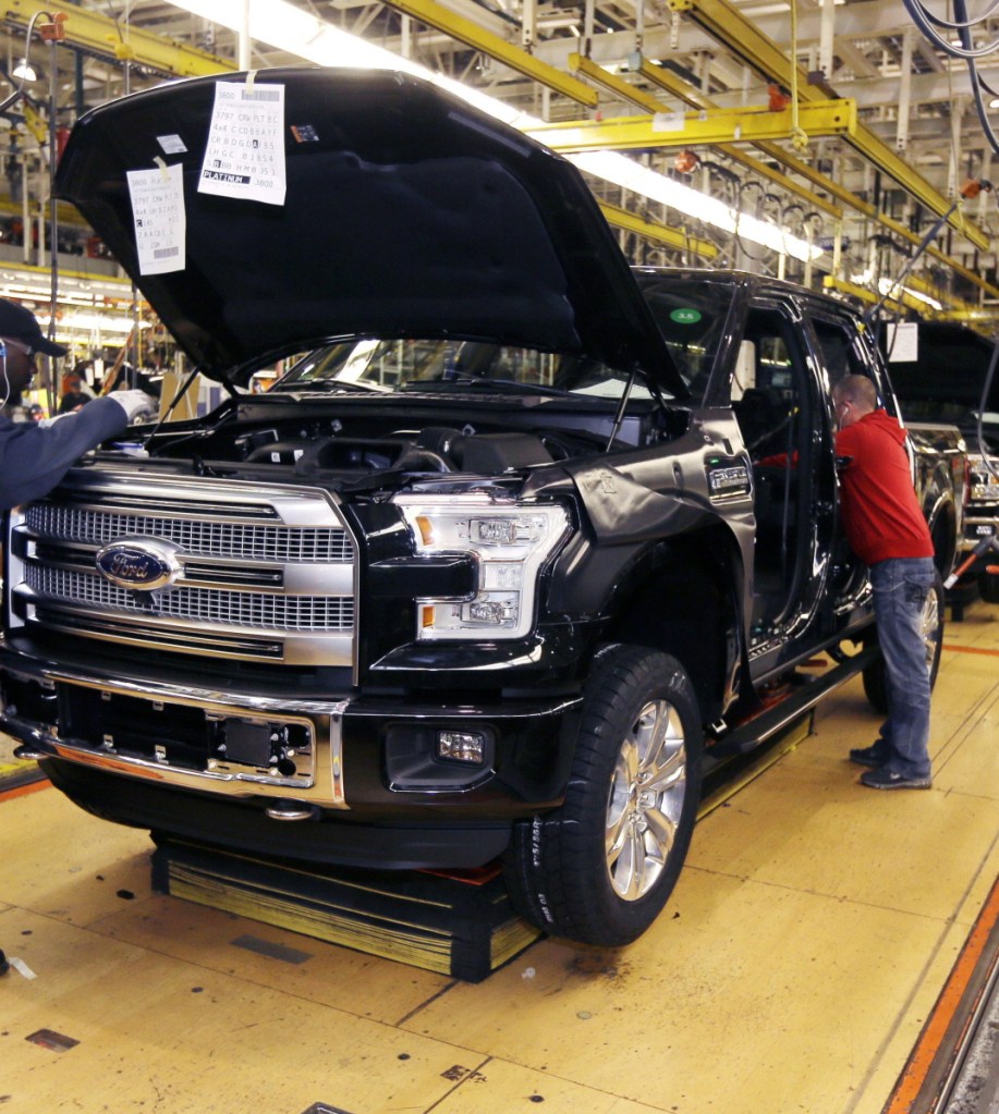 A Ford F-150 truck is assembled at the Rouge Truck Plant in Dearborn, Mich., in 2014.