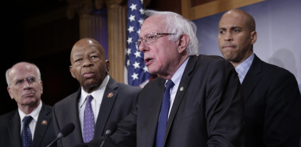 Sen. Bernie Sanders, I-Vt., center, joined from left by Rep. Peter Welch, D-Vt., Rep. Elijah Cummings, D-Md., and Sen. Cory Booker, D-N.J., leads efforts to reduce the cost of prescription drugs.