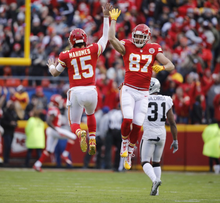 Kansas City quarterback Patrick Mahomes, left, and tight end Travis Kelce have spearheaded an offense that has show it can strike quickly. Now if the rest of the team does its share, the Chiefs may cast aside years of frustration.