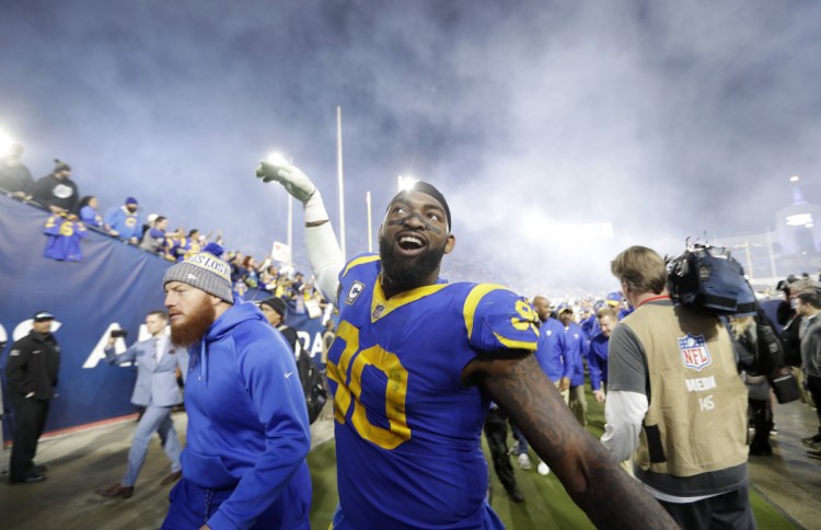 Los Angeles Rams defensive end Michael Brockers celebrates Saturday night after a physical 30-22 victory against the Dallas Cowboys put them in the NFC championship game at New Orleans.