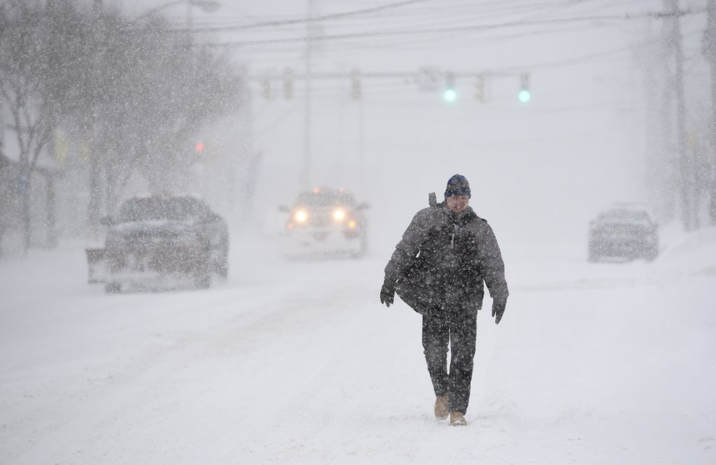 Central New York endures a snowstorm with freezing temperatures and wind in Syracuse.