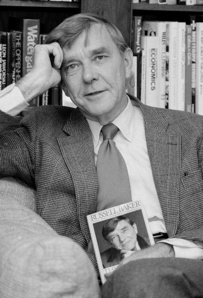 New York Times columnist and Pulitzer Prize-winning author Russell Baker poses in his office at the New York Times in 1983. Baker died Monday at the age of 93 from complications after a fall.
