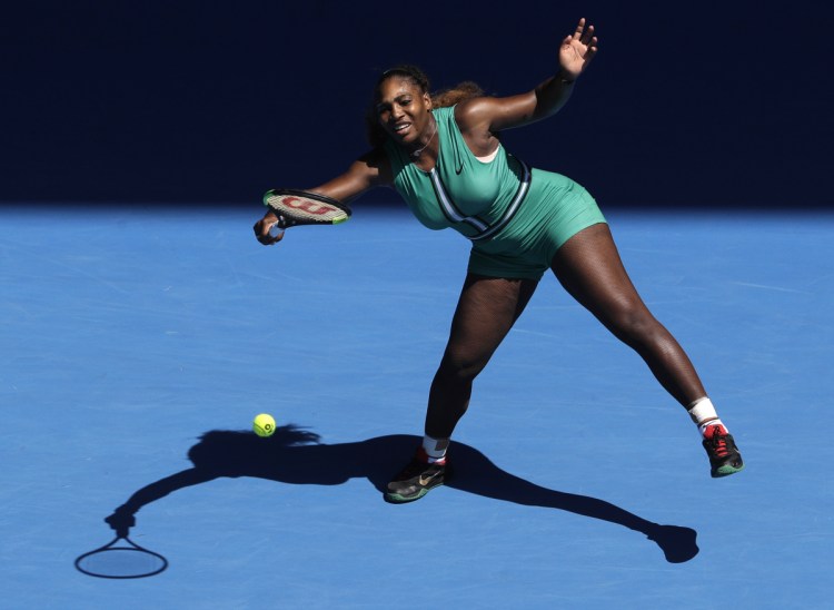 Serena Williams hits a forehand return to Karolina Pliskova of the Czech Republic during their quarterfinal match at the Australian Open.