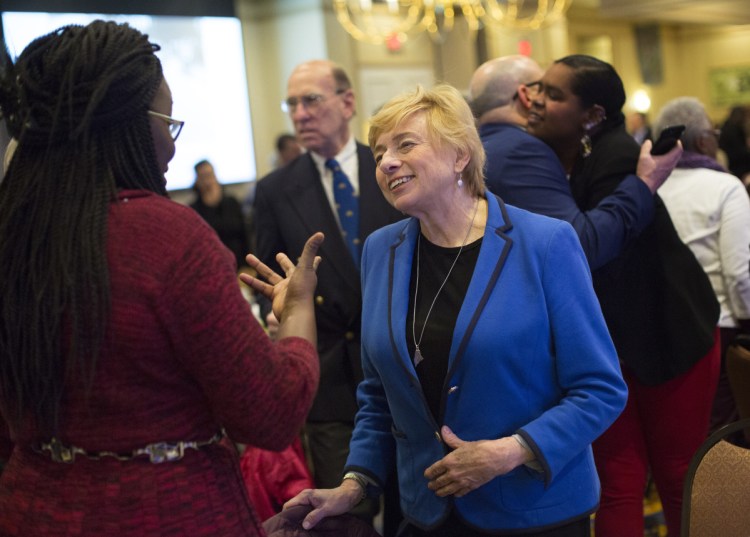 Gov. Janet Mills wears her silver State of Maine necklace at the annual Martin Luther King Jr. Day celebration in Portland this week. After her election last fall, Mills purchased similar pieces for members of her transition team.