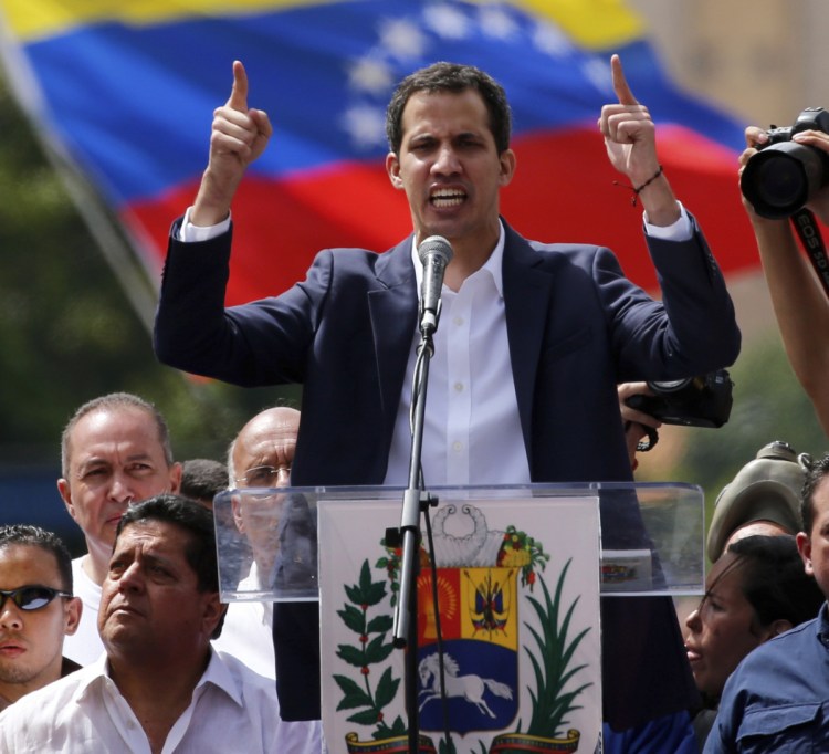 Juan Guaido, head of Venezuela's opposition-run congress, declares himself interim president of the nation until elections can be held Wednesday.