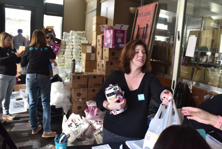 Lisa Oksala volunteers her time to help people with the District of Columbia Diaper Bank, which joined others around the country in providing diapers, wipes and feminine supply products to furloughed government workers. The bank has given away 33,800 diapers.