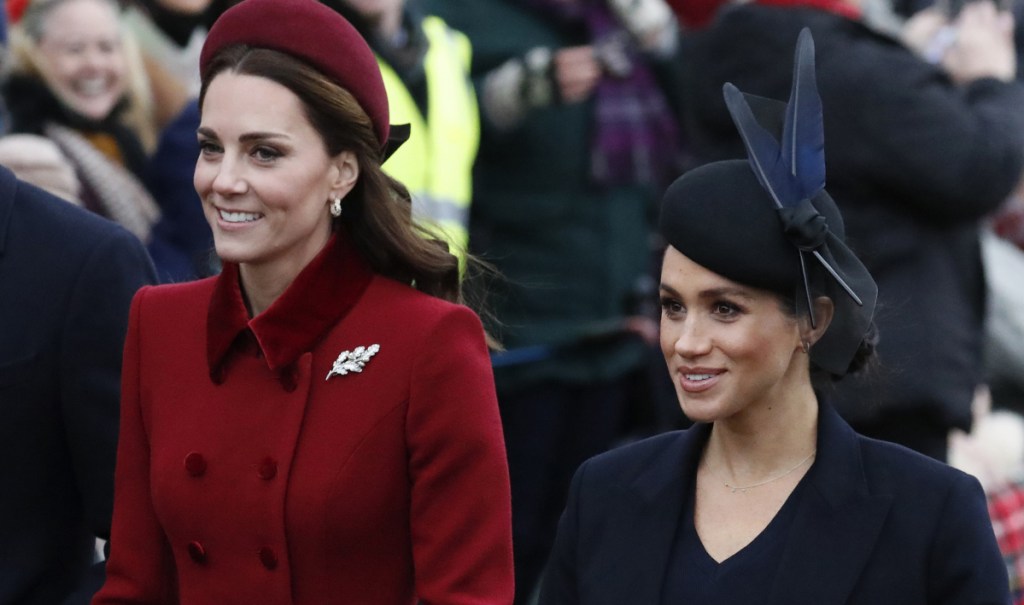Kensington Palace aides spend hours each week removing offensive comments about Duchesses Kate, left, and Meghan on its social media.