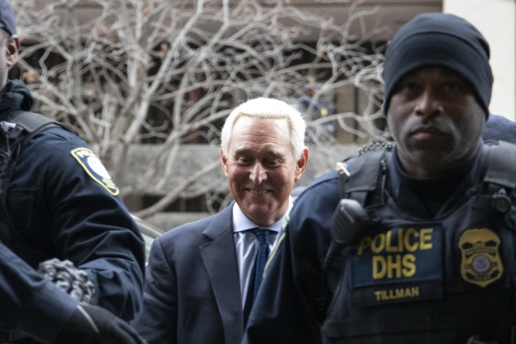 Roger Stone, former adviser to Donald Trump's presidential campaign, center, arrives at federal court in Washington, D.C., on Jan. 29, 2019.