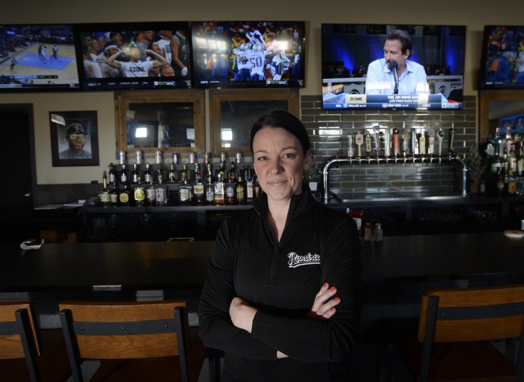 Jen Meader, who manages Rivalries locations in Falmouth, above, and Portland, says game time Sunday at the local sports bars "will be crazy busy."