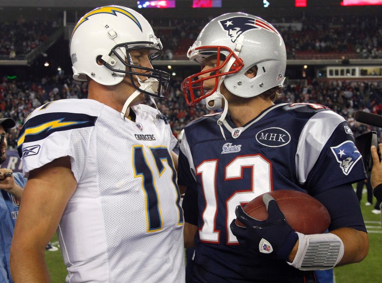 Patriots quarterback Tom Brady, right, and Chargers quarterback Philip Rivers have met seven times, including a 35-21 New England win back in 2011. Overall, Rivers is 1-7 against New England, 0-7 against Brady.