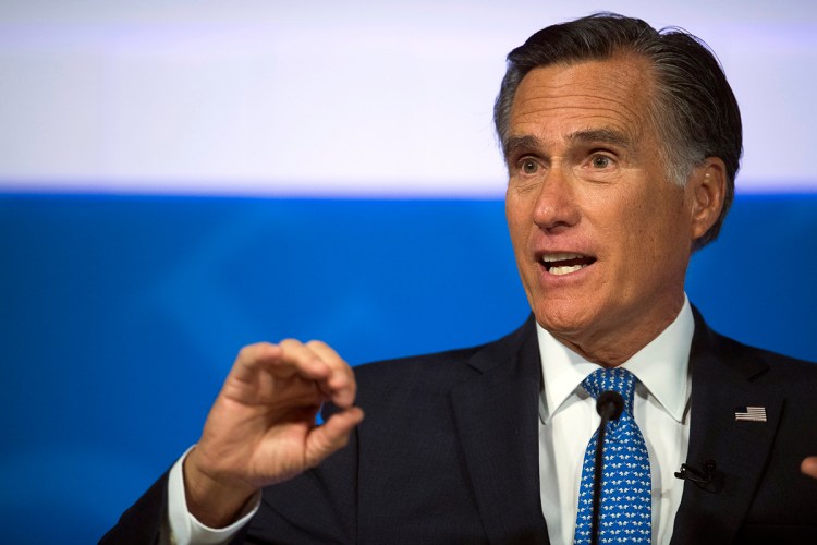 File-This Oct. 9, 2018, file photo shows Republican U.S. Senate candidate Mitt Romney answering a question about tariffs during the debate with Democratic opponent Jenny Wilson in the America First Event Center in Cedar City, Utah. Utah Sen.-elect Romney says President Donald Trump's "conduct over the past two years ... is evidence that the president has not risen to the mantle of the office." Romney, who was the Republican presidential nominee in 2012, is praising some of Trump's policy decisions in a Washington Post op-ed published Tuesday, Jan. 1, 2019. But he adds: "With the nation so divided, resentful and angry, presidential leadership in qualities of character is indispensable. And it is in this province where the incumbent's shortfall has been most glaring."(James M. Dobson/The Spectrum via AP, File)