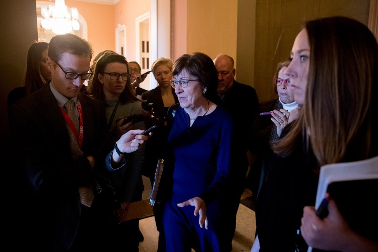 Sen. Susan Collins, R-Maine, speaks to reporters as she walks into the office of Senate Majority Leader Mitch McConnell of Ky. for a meeting with Senate Republicans on Capitol Hill in Washington, Thursday, Jan. 10, 2019. (AP Photo/Andrew Harnik)