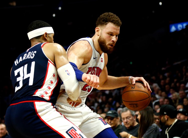 Detroit's Blake Griffin makes a move to the hoop while being guarded by the Clippers' Tobias Harris during the Pistons' 109-104 win Saturday in Los Angeles.