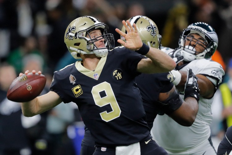 New Orleans Saints quarterback Drew Brees threw two touchdowns in a 20-14 win over the Philadelphia Eagles in an NFC divisional round game Sunday in New Orleans.