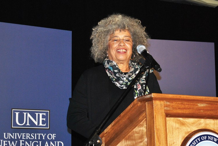 Civil-rights activist Angela Davis speaks at the University of New England in Biddeford during an observance for Dr. Martin Luther King Jr. on Wednesday. Davis has conducted research on issues related to race, gender and imprisonment.
