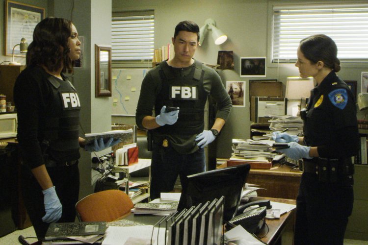 A Lewiston police officer, right, as depicted in "Criminal Minds," which aired Wednesday night.
