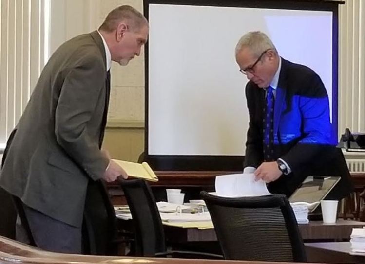 James Sweeney, left, formerly of Jay, and his co-defense lawyer Walter Hanstein confer during a break Thursday, the third day of Sweeney's murder trial in Franklin County Superior Court in Farmington.