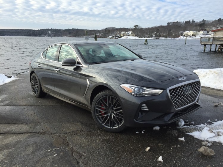 "The Genesis G70 has the necessary stance and performance of a mature sports sedan." Photo by Tim Plouff. Location: by the river in Damariscotta.
